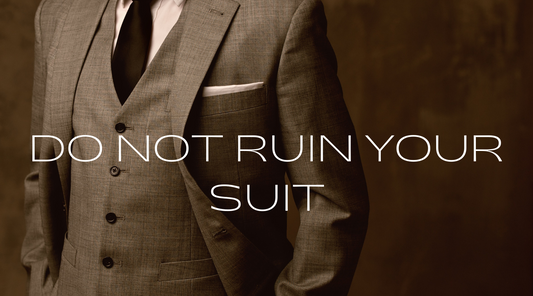 En man i brun kostym och rubriken Do Not Ruin Your suit.