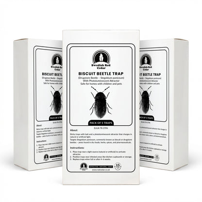 Three boxes of Swedish Red Cedar Biscuit Beetle Trap on a white background