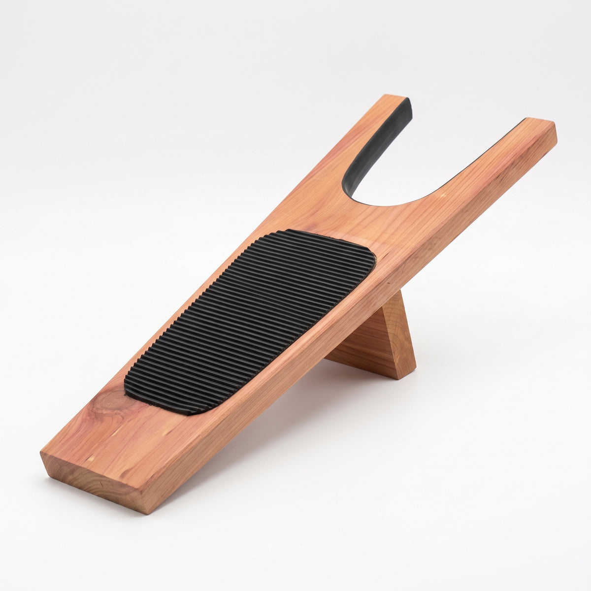 Premium cedarwood boot jack with black ribbed foot pad – front angle